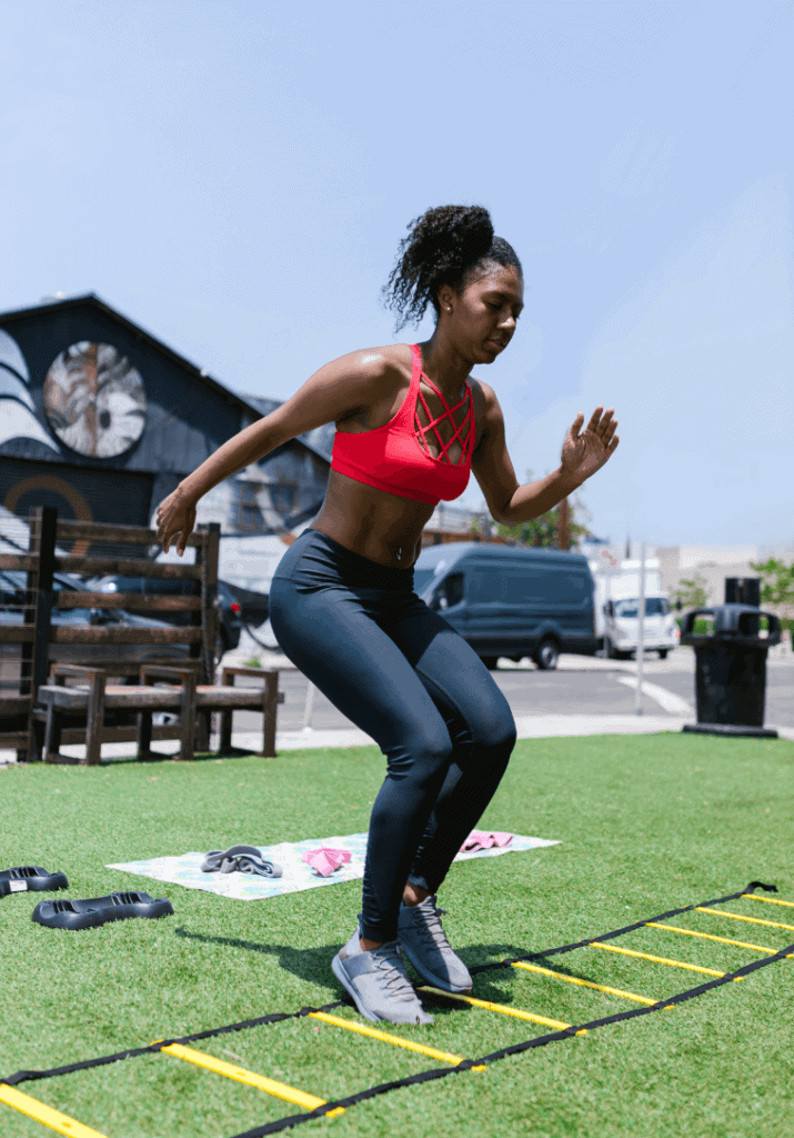 A woman getting ready to workout teaching how someone can stay motivated on your fitness journey
