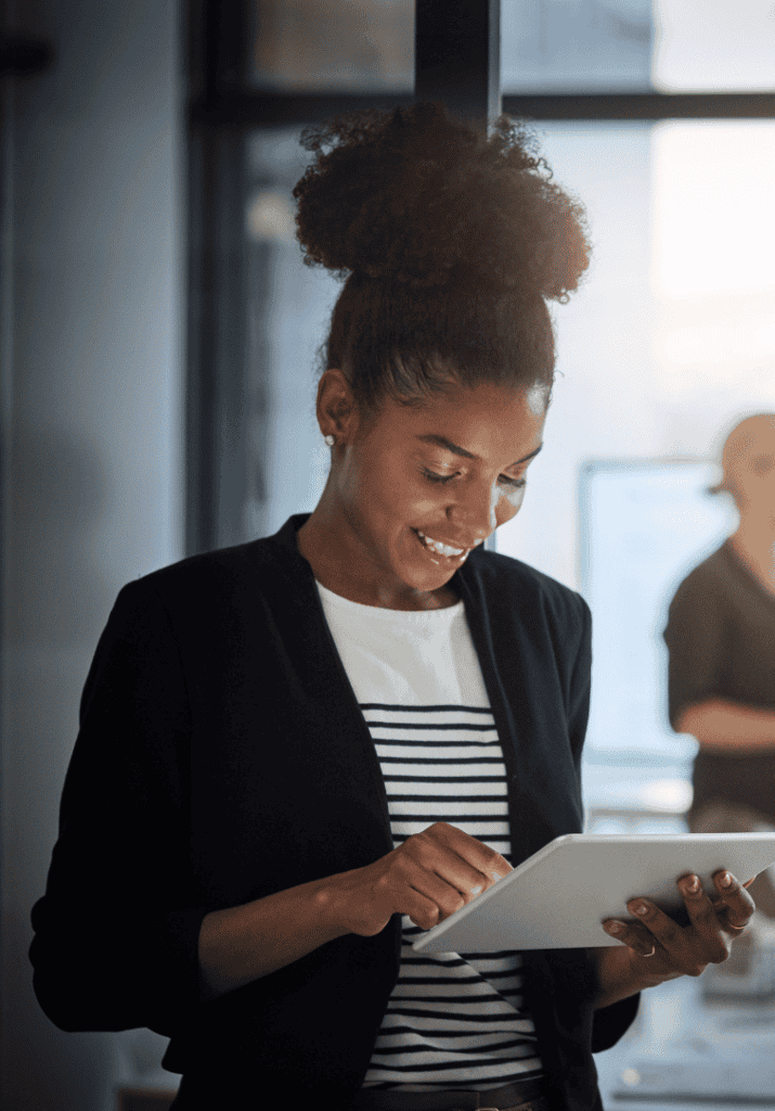 A woman looking at her ipad 