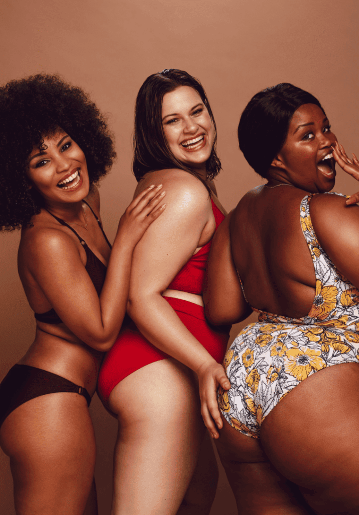 A plus size black woman with two other women of different races to showcase how Pretty privilege and body size connect 