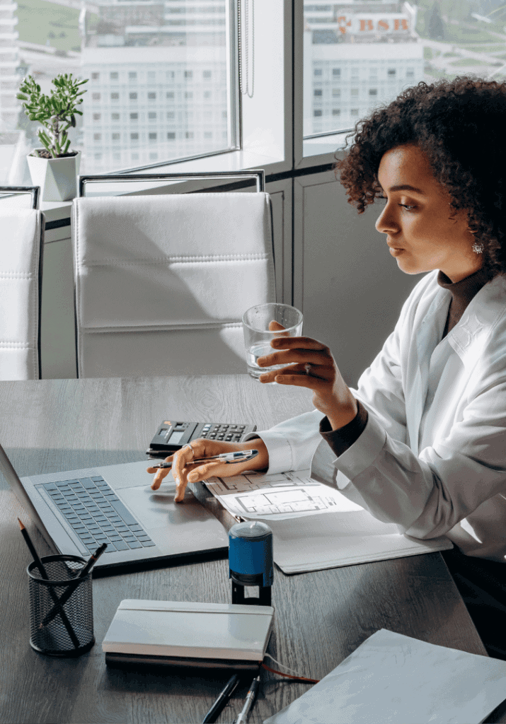 a woman in a nice office building, organizing her life.
