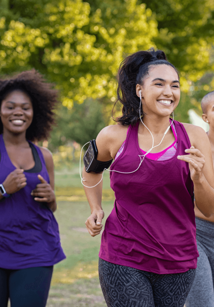 Women running together on their fitness journey