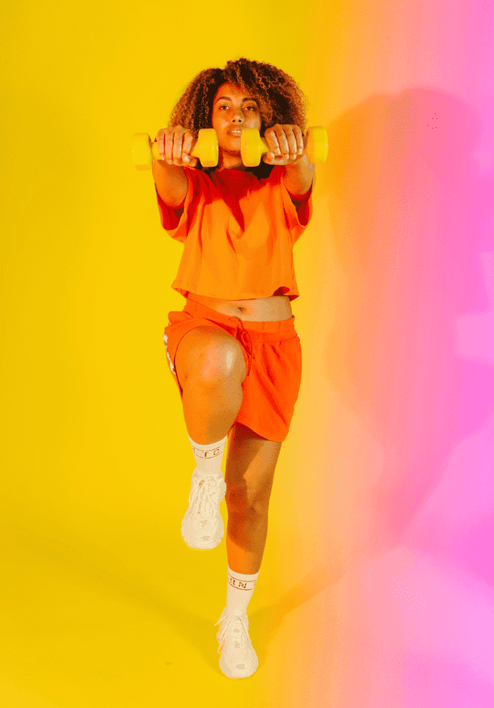 a picture of a woman learning how to track progress at the gym