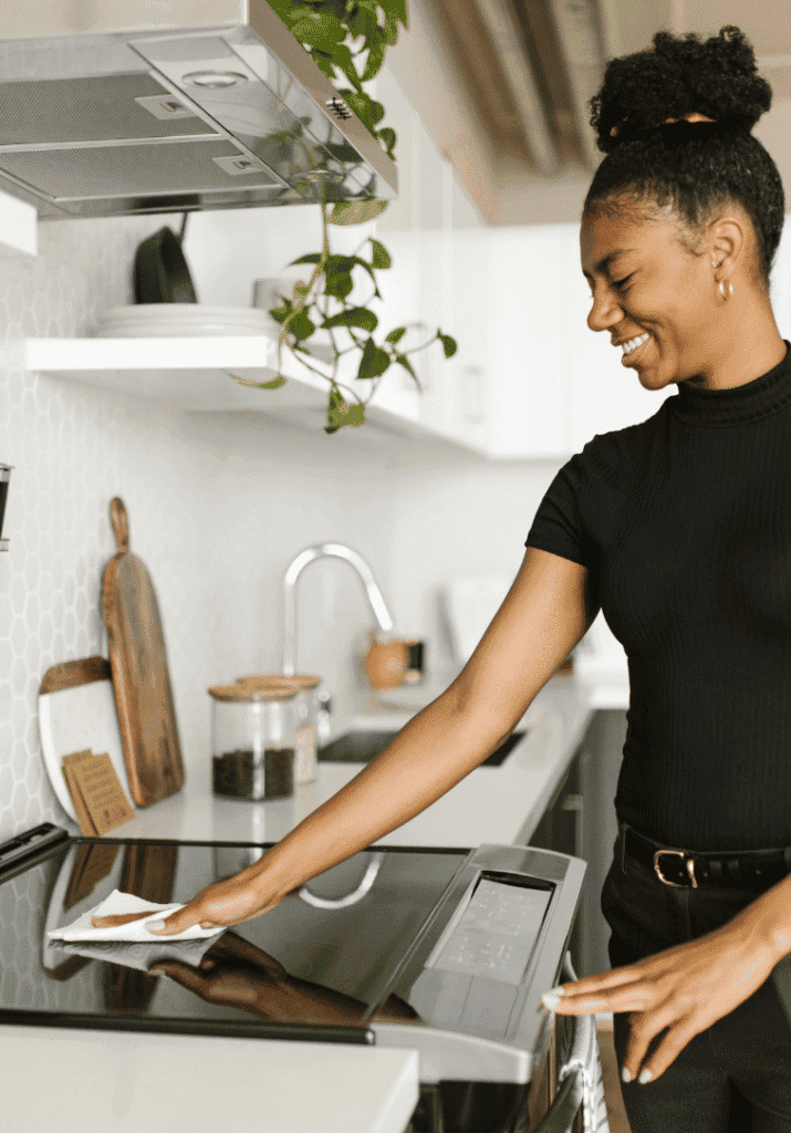 black woman cleaning her space