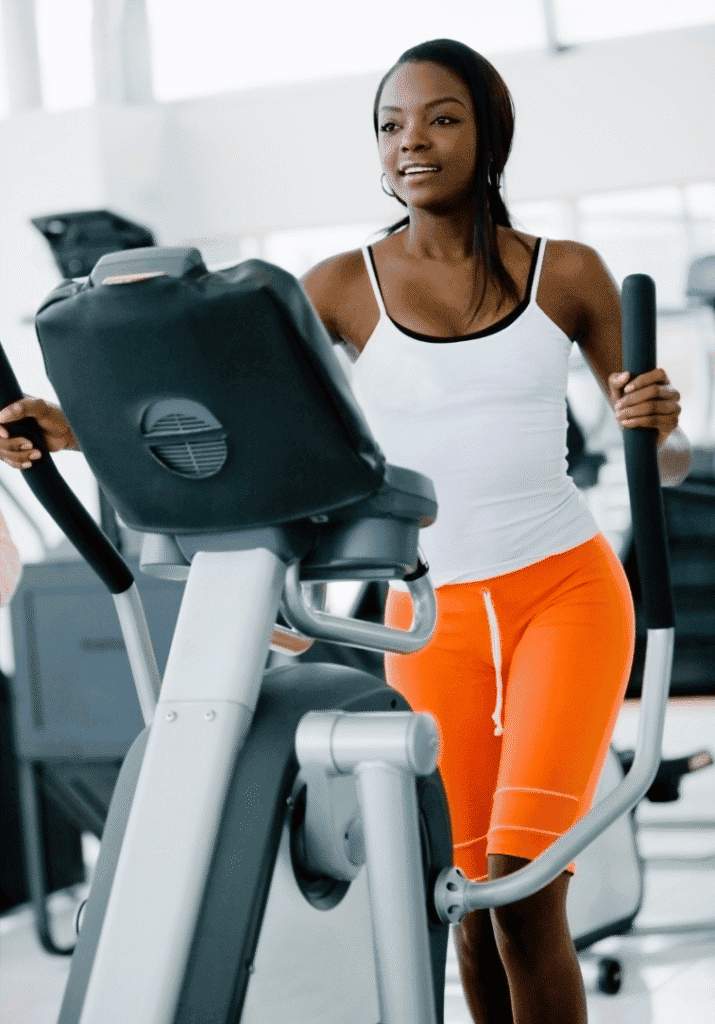 a woman running on the treadmill 
