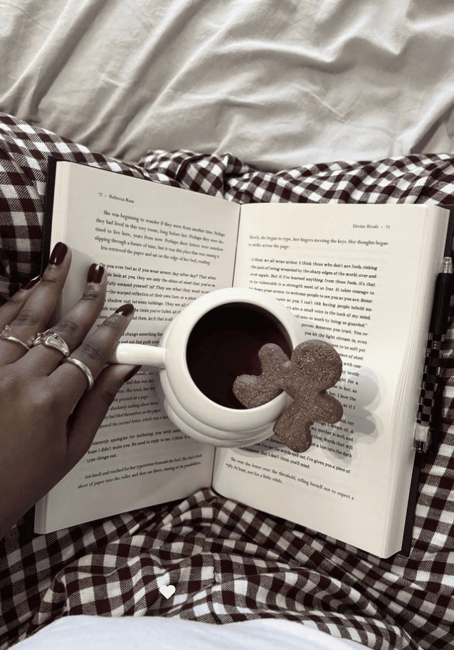 a woman with her cozy book