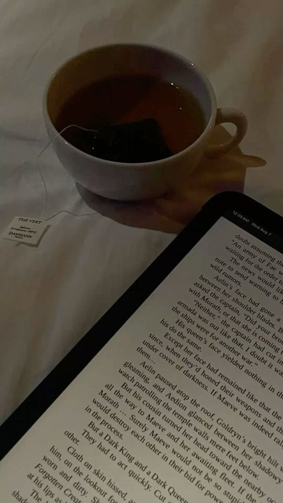 tea next to a book a really cozy gift for book lovers