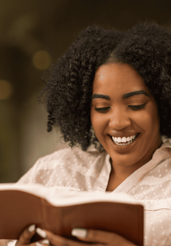 A woman reading a book about How to Get Your Life Together This Spring